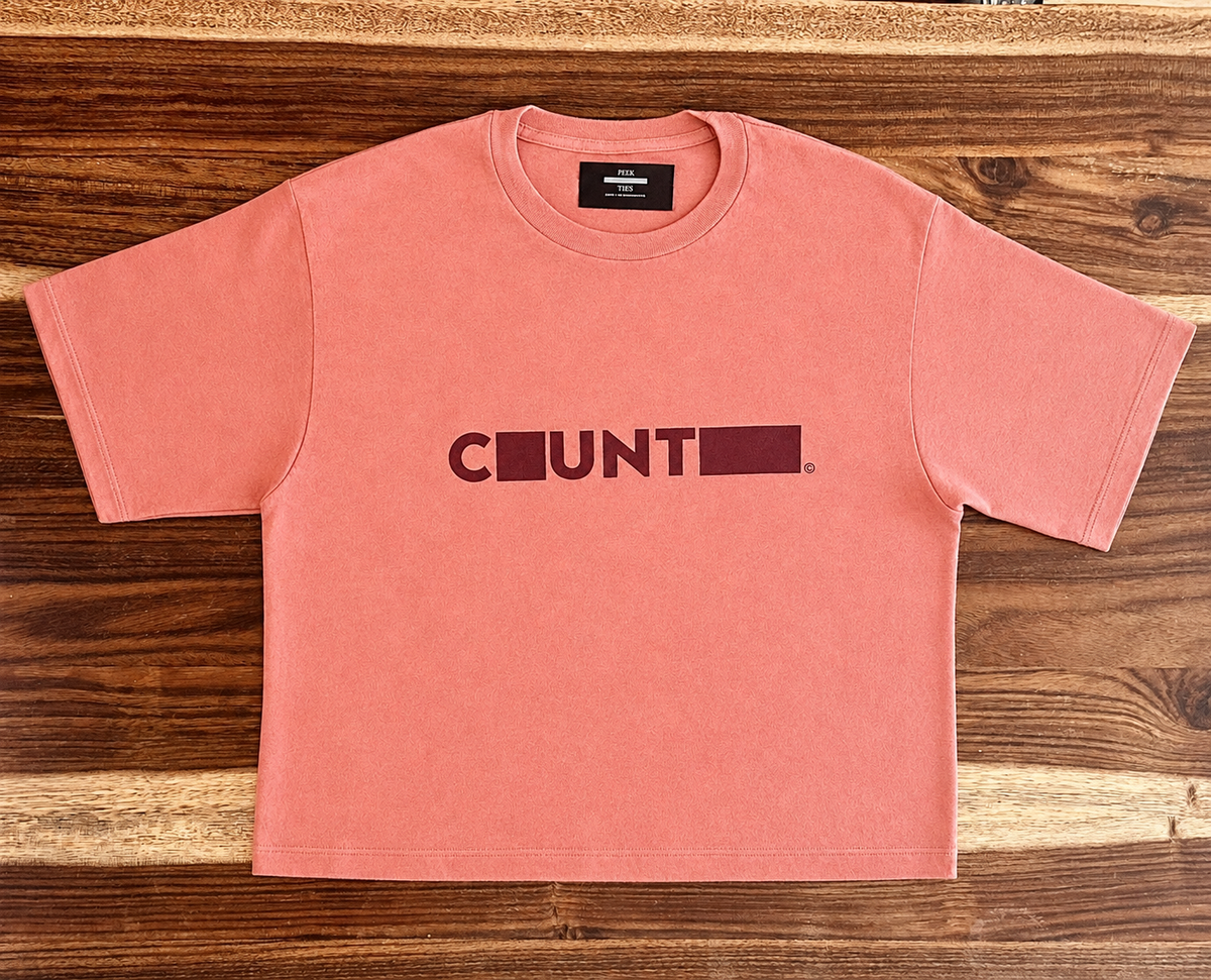 COUNTRY REDACTED™ 001.69
PROUD                                          CORAL + CRIMSON